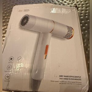White travel Hair Dryer with accessories